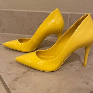 Aldo yellow patent leather pointed toe heels. Size 8.5. 4 inch heel. Worn once.